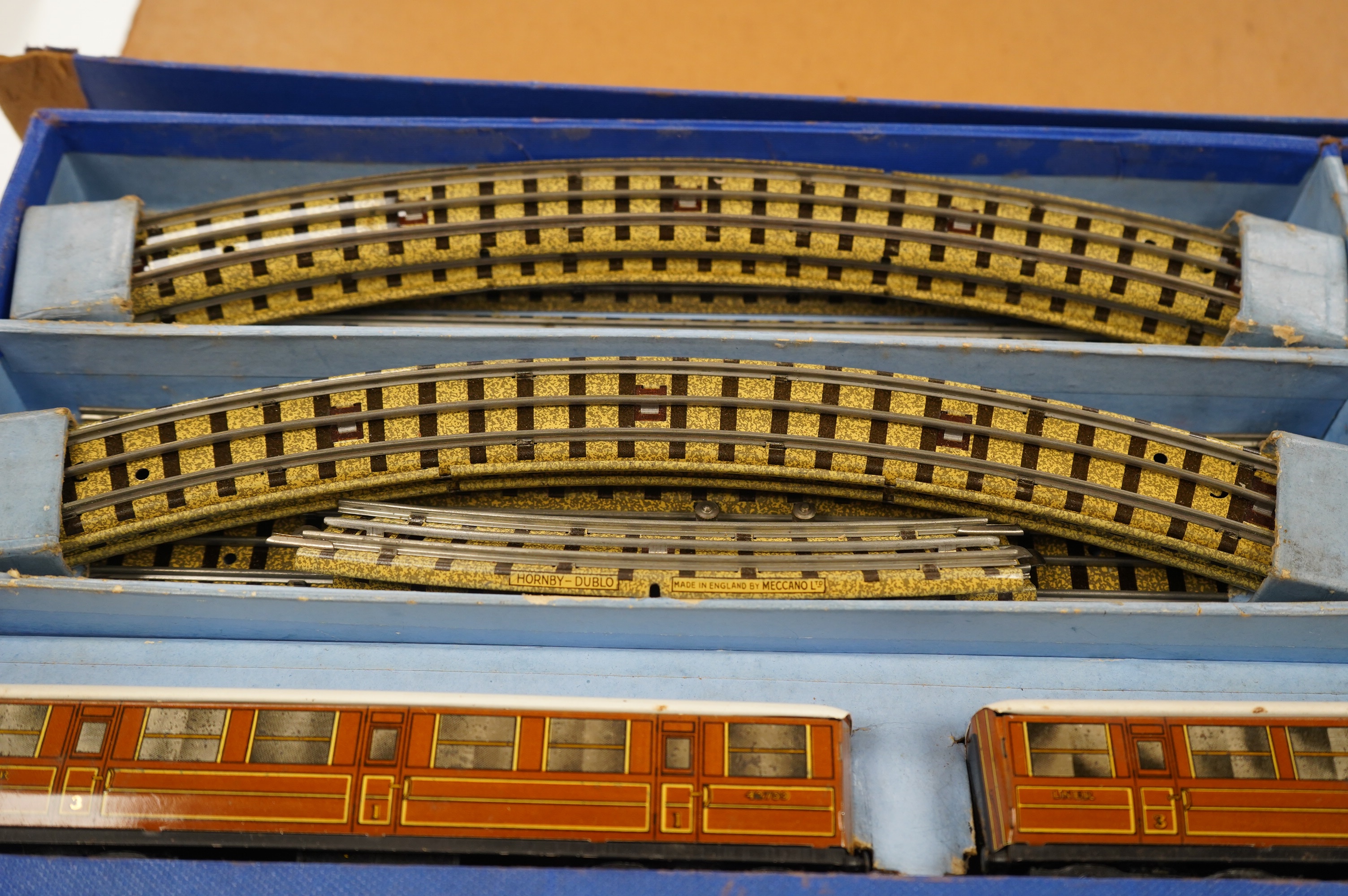 A boxed Hornby Dublo LNER Passenger Train set (EDP1) for 3-rail running, comprising of a class A4 4-6-2 locomotive, Sir Nigel Gresley, 7, two teak coaches and a quantity of track sections, etc. Condition - fair to good,